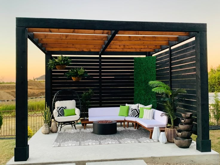 Elegant wooden pergola design in Dubai with outdoor seating and lighting.