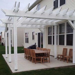 Modern pergola design in Dubai with stylish seating and outdoor lighting.
